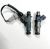 Fiveo OEM Upgrade fuel injectors shown with included Plug & Play Adapter